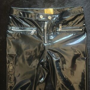 Black patent faux leather skinny pants with moto detail